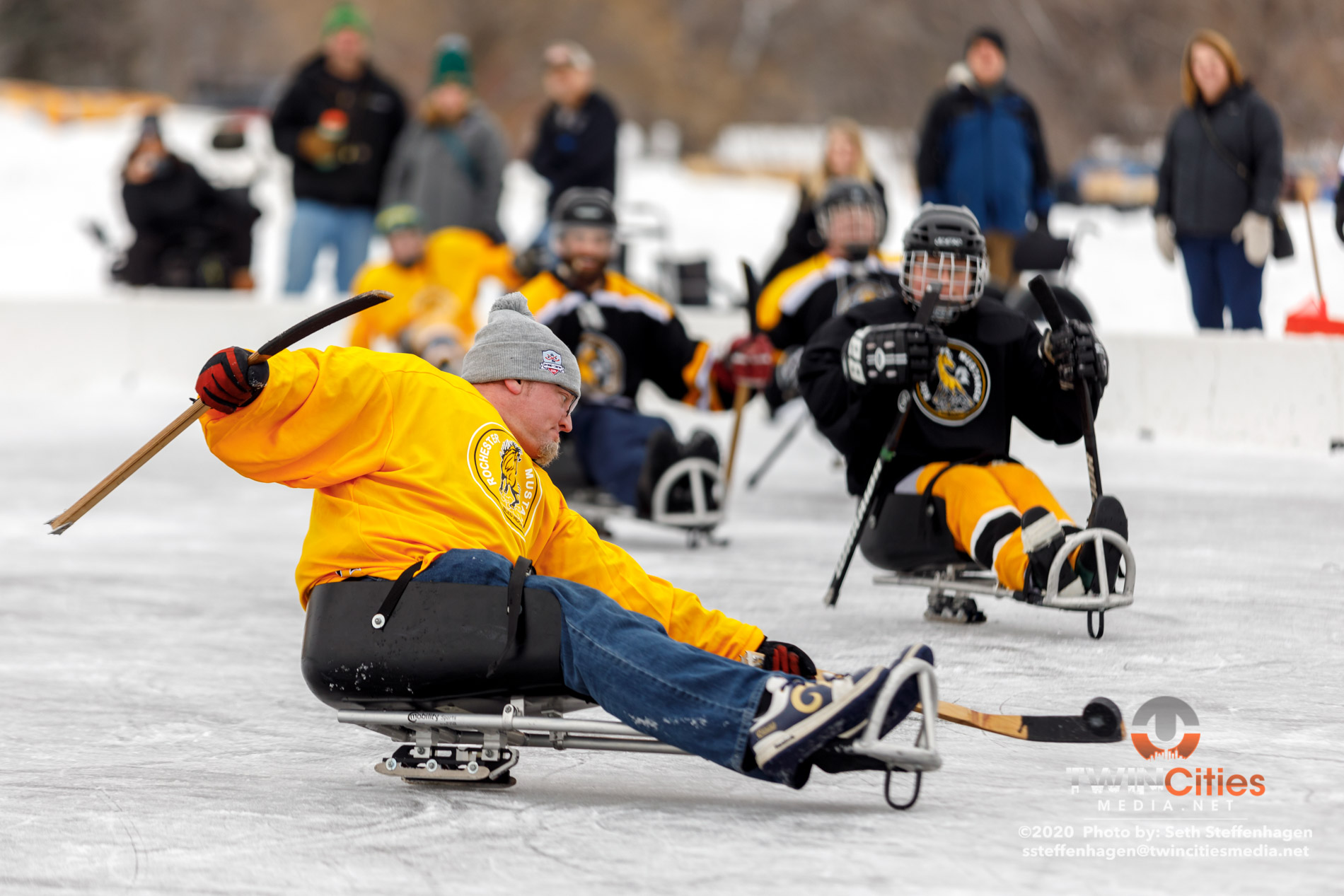 January 26, 2020 - Minneapolis, Minnesota, United States - Rochester Mustangs Gold take on Rochester Mustangs Black in the sled hockey championship game during the U.S. Pond Hockey Championships on Lake Nokomis. 

(Photo by Seth Steffenhagen/Steffenhagen Photography)